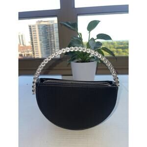 MMS Design Studio black silver buckle clutch, very stylish and elegant.